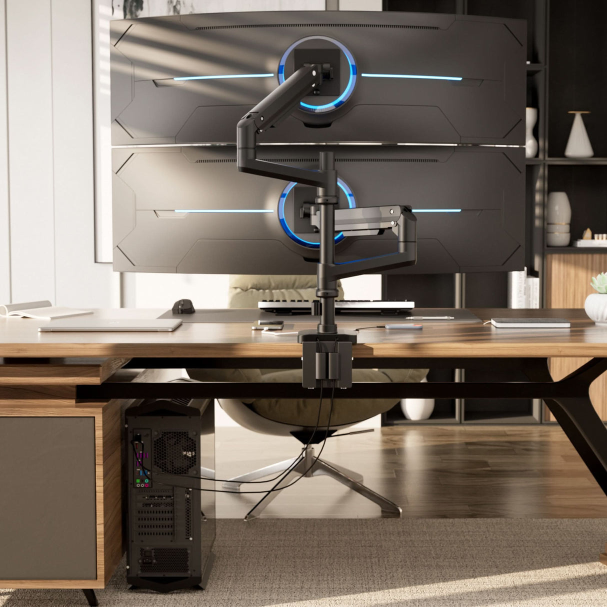 Heavy-Duty Dual Stacking Monitor Mount with Pole & Gas Spring Arms A modern office desk setup highlights the Mount-It! Heavy-Duty Dual Stacking Monitor Mount with Pole & Gas Spring Arms, vertically supporting two large curved monitors for a sleek workspace, with a desktop tower and stylish shelves in the background.