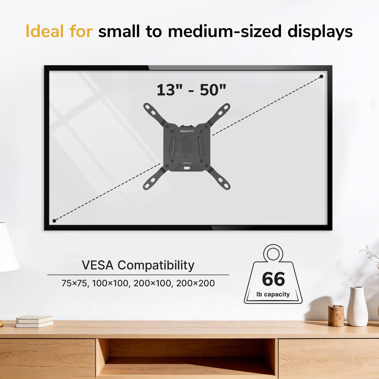 The Mount-It! Low-Profile TV Wall Mount fits 13–50" displays, supports up to 66 lbs, and is VESA compatible (75x75, 100x100, 200x100, 200x200). Shown installed in a modern room.