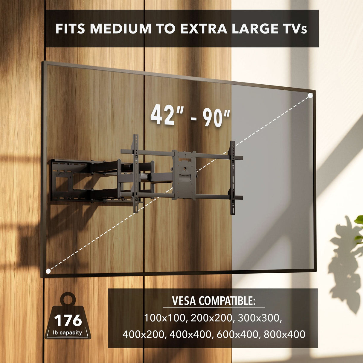 Heavy Duty Dual Arm TV Wall Mount with Extra Long Extension The Mount-It! Heavy Duty Dual Arm TV Wall Mount with Extra Long Extension is shown on a wooden wall, holding a transparent outlined TV labeled 42-90". It fits medium to extra-large TVs, supports up to 176 lbs, and lists VESA compatible sizes.