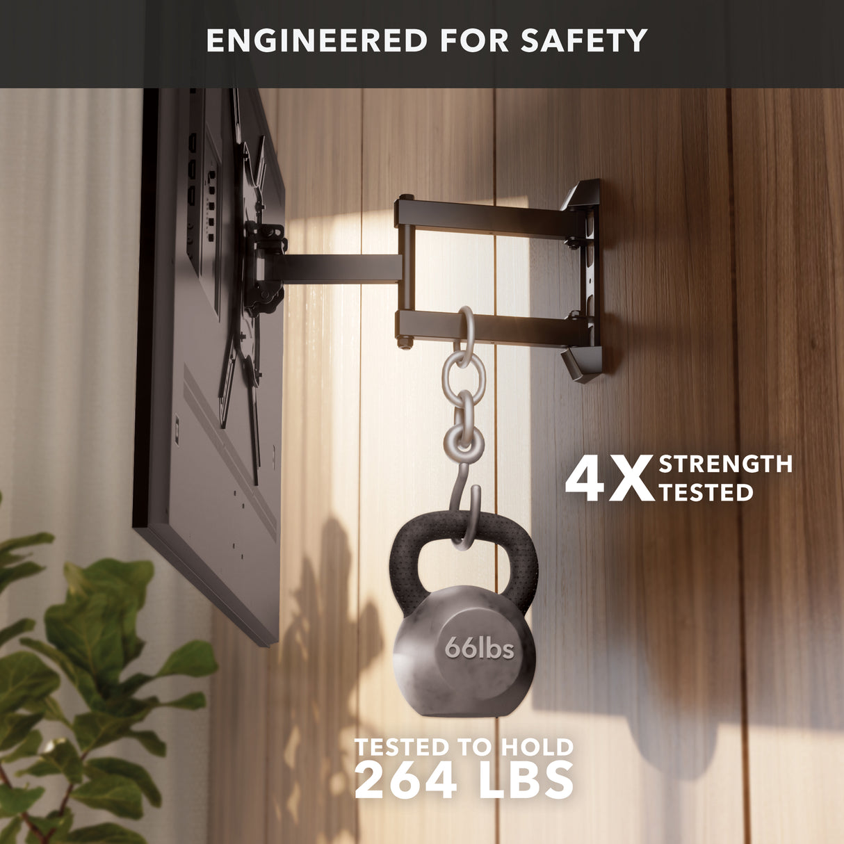 Full Motion TV Wall Mount The Mount-It! Full Motion TV Wall Mount supports a TV and a 66-pound kettlebell, proving its strength. Text: Engineered for safety, 4X strength tested, tested to hold 264 lbs. A plant is placed near a wooden wall.