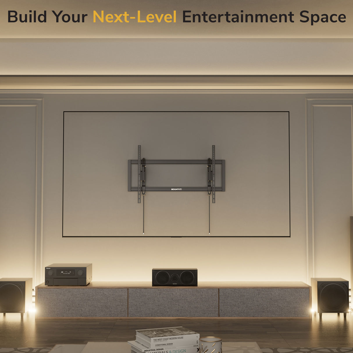 Heavy-Duty XL Advanced Tilt TV Wall Mount A modern home entertainment space features the Mount-It! Heavy-Duty XL Advanced Tilt TV Wall Mount, speakers, and audio gear on a sleek console. Soft lighting accentuates minimalist décor with clean cable management. Top text: “Build Your Next-Level Entertainment Space.”.