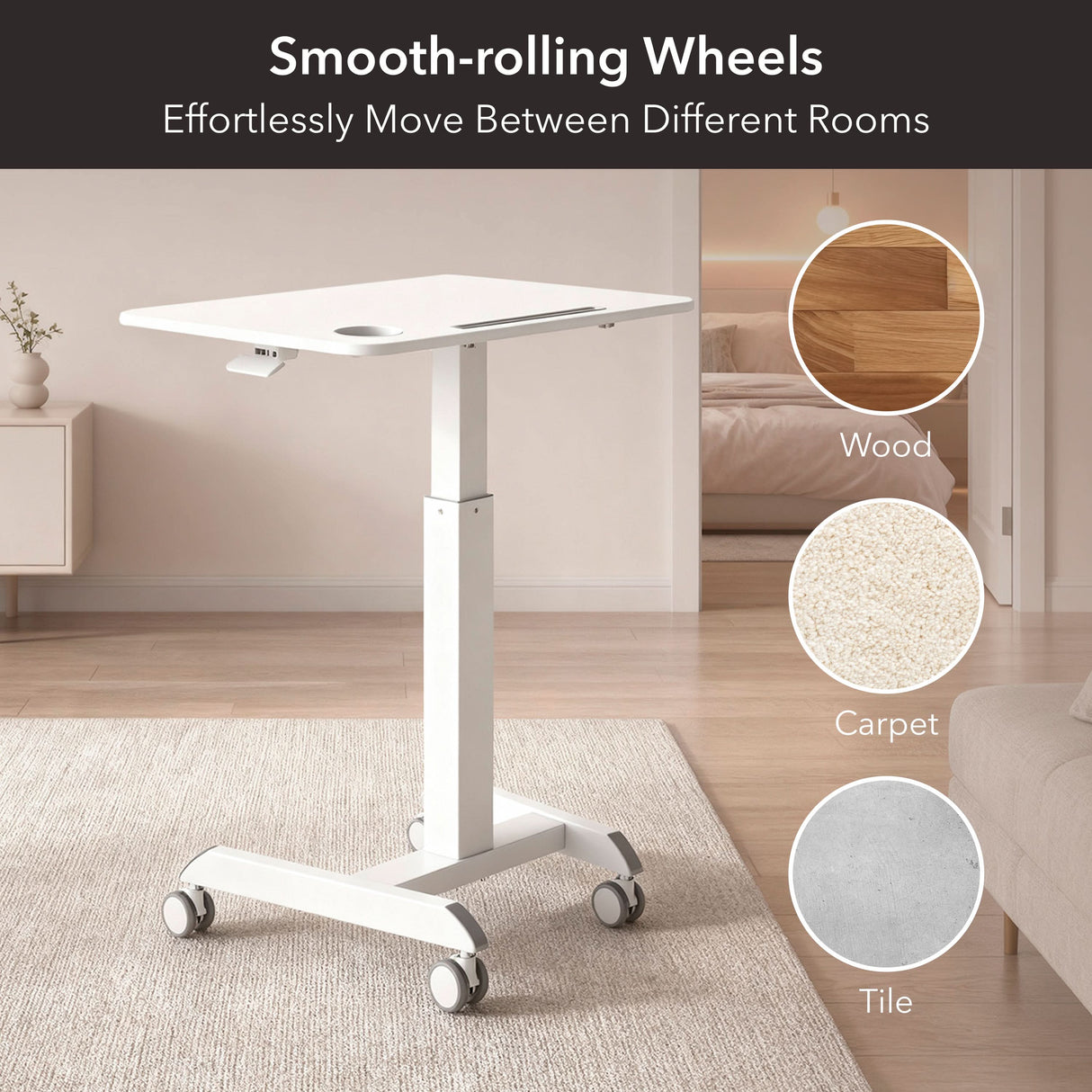 Sit-Stand Mobile Laptop Cart The Mount-It! Sit-Stand Mobile Laptop Cart in white is displayed in a living room, showcasing its smooth-rolling wheels for easy mobility on wood, carpet, and tile—ideal as a versatile mobile workstation.