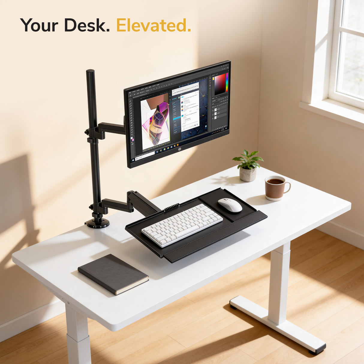 A modern white desk features the Mount-It! Single Monitor Sit-Stand Desk Mount with Keyboard Tray, complete with a mouse, notebook, plant, and coffee cup. Sunlight streams in as “Your Desk. Elevated.” appears at the top left.