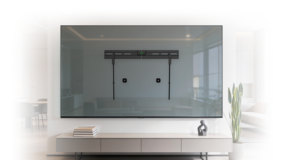 A minimalist living room with a low white TV stand, decor, and a wall-mounted TV bracket framed as art. A vintage clock hangs on the wall, and a cushion and ball are on the wooden floor.
