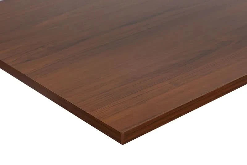 A close-up of the Mount-It! Hand Crank Standing Desk's 55" rectangular tabletop with a dark brown wood finish and visible grain, designed to fit its height-adjustable black base.