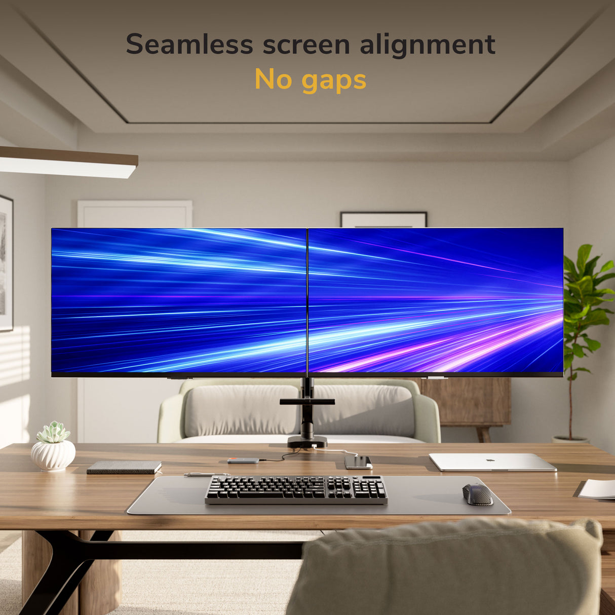 A modern office showcases the Mount-It! Dual Monitor Mount with Gas Spring Arm and Crossbar, holding two large side-by-side screens aligned seamlessly under the text: Seamless screen alignment No gaps, displaying a blue and purple light streak background.