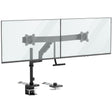 The Mount-It! Dual Monitor Mount with Pole and Crossbar in black supports two monitors side by side. It attaches securely to your desk with a clamp, and installation tools are included.