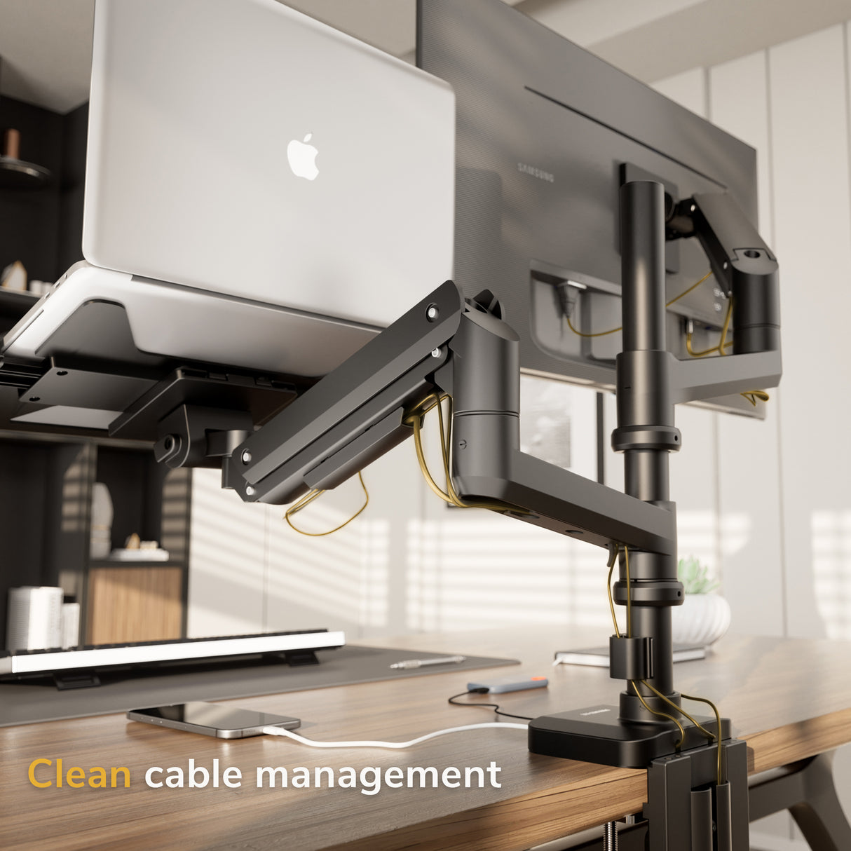 A modern desk includes the Mount-It! Heavy-Duty Monitor and Laptop Mount with pole and gas spring arms, holding a laptop and monitor, with neatly organized cables. “Clean cable management” is shown in the bottom left corner.
