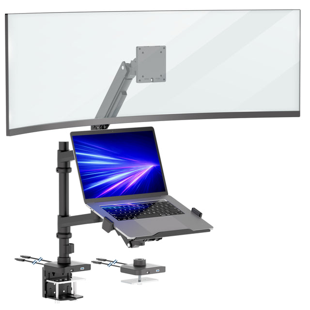 A curved monitor and an open laptop with a blue screen are mounted on the Mount-It! Heavy-Duty Monitor and Laptop Mount, featuring black gas spring arms and a pole, clamped to the desk edge.