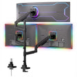 The Mount-It! Heavy-Duty Triple Monitor Mount in black features dual gas spring arms with colorful LED borders for two monitors, a top mount for a curved screen, and includes two desk mounting options shown on the left.