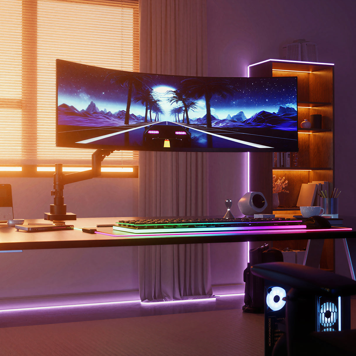 A modern gaming setup features a large curved monitor on the Mount-It! Heavy-Duty Monitor Mount with Gas Spring Arm, displaying a neon city drive. The desk showcases rainbow-lit accessories, soft purple-orange lighting, and organized shelves.