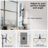 The Mount-It! Heavy-Duty Dual Stacked Monitor Wall Mount in an office offers 28.7" height adjustment, +50°/-20° tilt, ±180° rotation, and ±90° swivel. Feature icons are shown; a cityscape can be seen through the window.