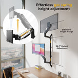 The Mount-It! Heavy Duty Dual Stacked Monitor Wall Mount with Gas Spring is installed on a wall above a desk by a window, supporting monitors with effortless height adjustment and an extended 28.7-inch adjustable height range.