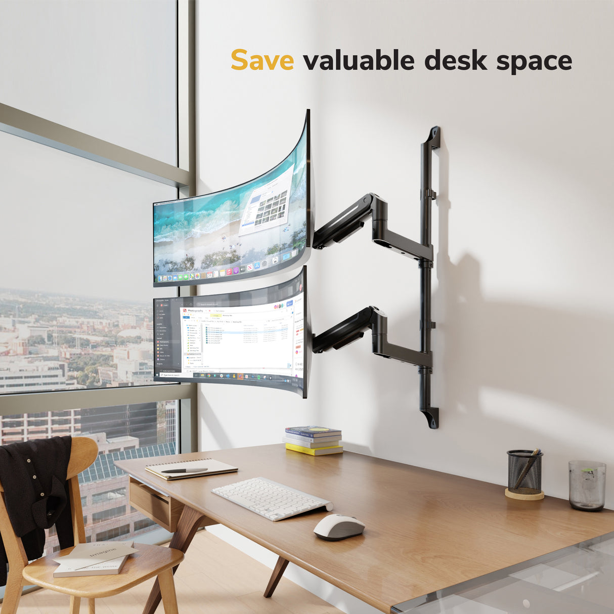 A modern office setup showcases two curved monitors on the Mount-It! Heavy Duty Dual Stacked Monitor Wall Mount with Gas Spring above a wooden desk, freeing up space for a keyboard, mouse, notepad, and pen holder. Text: Save valuable desk space.