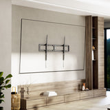 Modern living room with a wall-mounted TV and wooden entertainment unit.