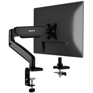 The Mount-It! Single Monitor Desk Mount with Gas Spring Arm is securely clamped to the desk, supporting a flat-screen. A second clamp mount is also shown, demonstrating simple installation and built-in cable management for a tidy workspace.