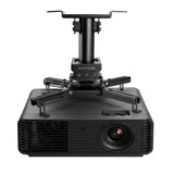 A black projector is securely attached to a Mount-It! Heavy-Duty Universal Projector Ceiling Mount, viewed from the front. The lens is on the right side, and the mount is firmly fixed to the top of the projector.