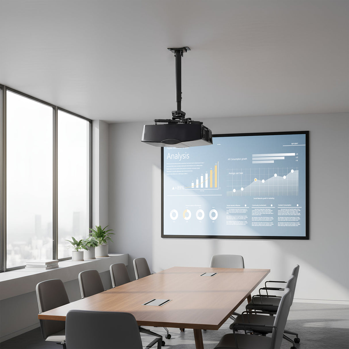 A modern conference room with a long wooden table, gray chairs, large windows, and a Mount-It! Heavy-Duty Universal Ceiling Projector projecting charts onto a wall screen. A plant decorates the windowsill.