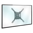 A flat-screen TV mounted on a wall with a black Mount-It! Low-Profile Tilt TV Wall Mount, with the compact bracket visible behind the center of the screen.