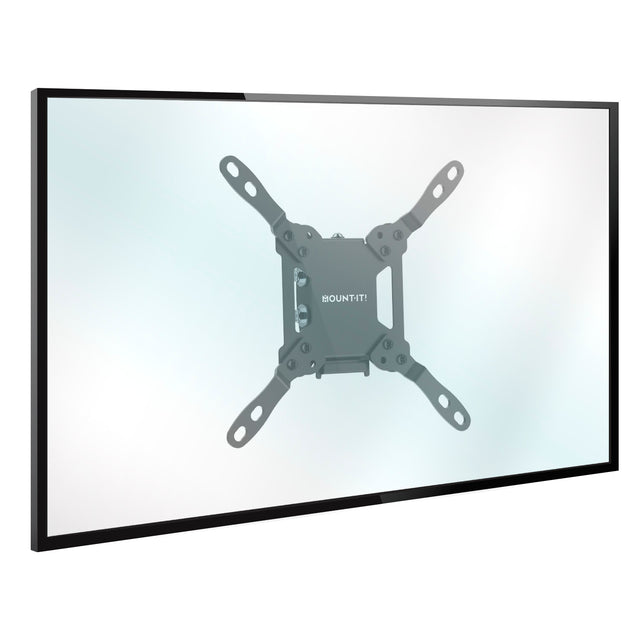 A flat-screen TV mounted on a wall with a black Mount-It! Low-Profile Tilt TV Wall Mount, with the compact bracket visible behind the center of the screen.