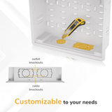 A Mount-It! In-Wall Media Box - Large is shown in white with punch-out knockouts. A utility knife points to a knockout. Below, labels show outlet and cable knockouts. Text: Customizable Wi-Fi transparent enclosure for your needs.