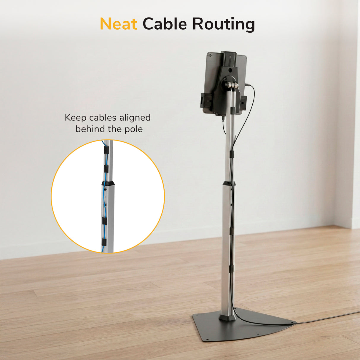 The Mount-It! Secure Universal Tablet Floor Stand with Lock sits on a wooden floor, featuring cables neatly routed along the back of the pole. An inset highlights the cable alignment clips. Text reads: Neat Cable Routing.