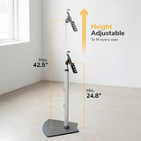 The Mount-It! Secure Universal Tablet Floor Stand with Lock is displayed in a bright room, showing a max height of 42.5" and min height of 24.8". Text reads "Height Adjustable to fit every user," with an upward yellow arrow.