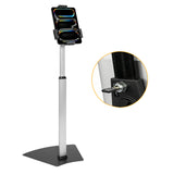The Mount-It! Secure Universal Tablet Floor Stand with Lock is displayed with a mounted tablet. An inset shows a close-up of a key in the lock, highlighting its security—perfect for retail kiosk use.
