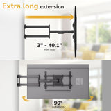 Mount-It! Full-Motion TV Wall Mount with 40" Extension shown in side and top views: dual-arm design, extends 3 to 40", tilts, swivels, and rotates TV 90°. Blurred living room background; text highlights key product features.
