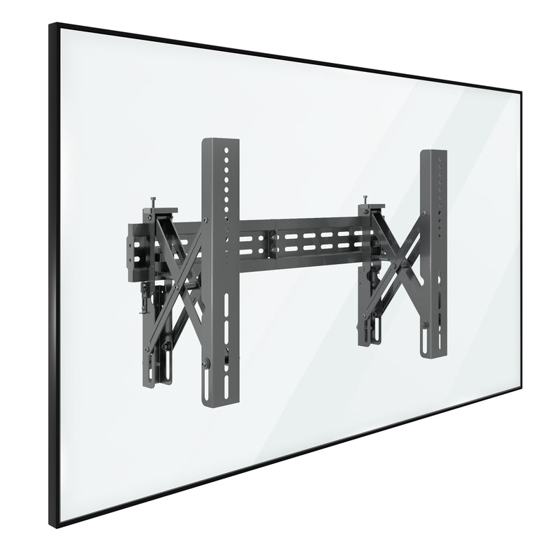 A flat-screen TV is mounted on the Mount-It! Pop-Out Video Wall Mount, shown from an angle that highlights the sturdy metal support structure behind the screen.