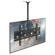A basketball player leaps for a dunk on a flat-screen TV mounted to the ceiling with the black Mount-It! Full-Motion TV Ceiling Mount in a brightly lit indoor arena.