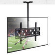 A Full-Motion TV Ceiling Mount by Mount-It! holds a flat-screen TV showing a football game, with players in action on a green field and a stadium crowd in the background.