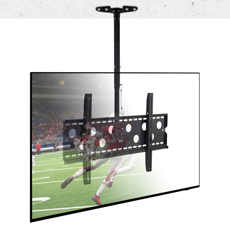 A Full-Motion TV Ceiling Mount by Mount-It! holds a flat-screen TV showing a football game, with players in action on a green field and a stadium crowd in the background.