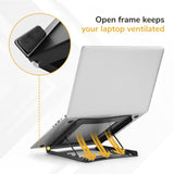 A silver laptop sits on the Mount-It! Portable Folding Laptop Stand, shown with yellow arrows illustrating airflow. Text reads, Open frame keeps your laptop ventilated. An inset shows a close-up of the stand’s rubber grip.