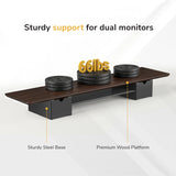 The Mount-It! Extra Wide Monitor Riser with Drawers and Shelf features a dark wood platform and sturdy steel base, supports up to 66 lbs, and provides ergonomic benefits for dual monitors. Labels highlight the organized design with storage.
