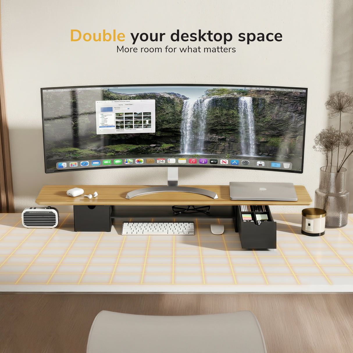 A modern desk setup featuring the Mount-It! Extra Wide Monitor Riser with Drawers and Shelf, curved monitor, keyboard, mouse, organizer, mini fan, and plant. Text above: Double your desktop space. More room for what matters.