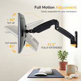 The Mount-It! Single Monitor Wall Mount Arm offers VESA compatibility, gas spring arms with +90° to -45° tilt, and a 21.2" extension. The organized wooden desk workspace includes a keyboard, mouse, and potted plants.
