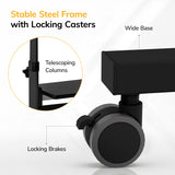 Close-up of a black locking caster with brakes on the wide steel frame of the Mount-It! Height Adjustable Rolling Stand up Desk. Inset displays telescoping columns, ideal for adjustability. Text: “Stable Steel Frame with Locking Casters.”.