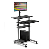 The Mount-It! Rolling Computer Work Station in grey features a height-adjustable design with wheels, a monitor mount displaying colorful lines, space for a keyboard and mouse, plus a lower shelf for a desktop tower.