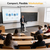 A man uses the Mount-It! Laptop Cart with Pull-Out Keyboard Tray while presenting in a university classroom. A projected chart and filled blackboard are visible. Text reads: Compact, Flexible Laptop Cart for Schools and Offices.