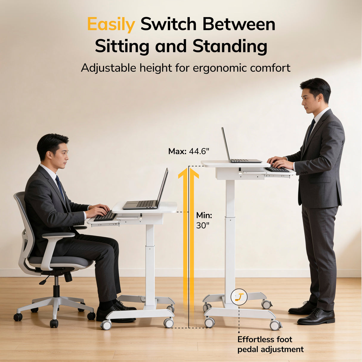 Two men in suits use the Mount-It! Laptop Cart with Pull-Out Keyboard Tray, one sitting and one standing. This mobile desk adjusts from 30 to 44.6 inches high with a foot pedal, allowing easy ergonomic transitions throughout the workday.