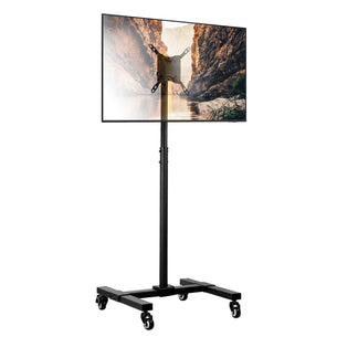 The Mount-It! Adjustable Mobile TV Stand, featuring locking casters, displays a scenic canyon landscape with a river on its flat-screen TV.