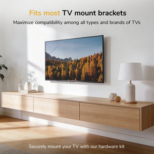 A modern living room displays a flat-screen TV mounted with the Mount-It! TV Hardware Kit above a wooden console, accented by books, a lamp, and plants. Text on the image highlights the TV mount bracket's wide compatibility.