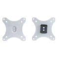 Two silver Mount-It! Replacement Monitor VESA Plates are shown: the left fits 100x100mm VESA with two center screws, while the right has a black bracket labeled "TOP" attached at the center.