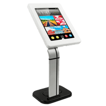 A sleek white digital kiosk with a touchscreen display mounted on an adjustable metal stand, featuring a black rectangular base for stable support. The screen shows a colorful interface with icons and a wallpaper displaying a variety of vibrant images, including urban and natural scenes, under a time and date display, designed for interactive user engagement in public or commercial spaces.